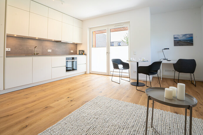 Offene Wohnküche_Wohnung kaufen_Außenansicht_Anlageimmobilie Herzkamp Eigentumswohnung kaufen_Gundlach Bauträger aus Hannover