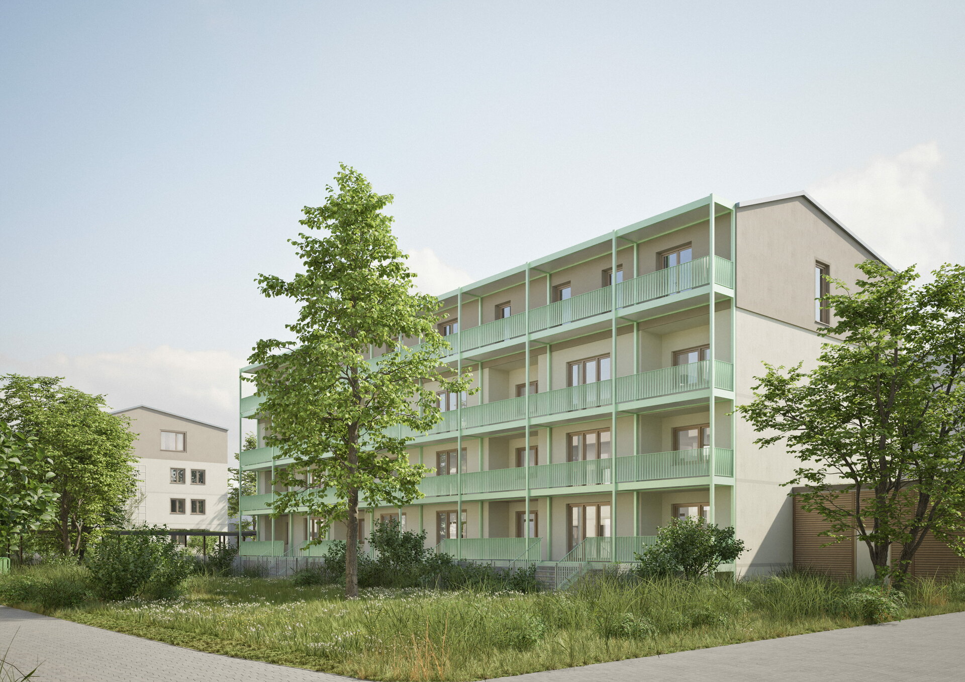 Nach energetischer Sanierung: Mehrstöckiges Wohngebäude mit Balkonen und umliegendem Grün in einer Wohnanlage in Hannover.