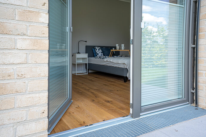 Schlafzimmer_Wohnung kaufen_Außenansicht_Anlageimmobilie Herzkamp Eigentumswohnung kaufen_Gundlach Bauträger aus Hannover