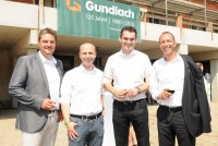 Peter Duensing, Technischer Leiter Gundlach Bauträger, Henrik Scholz und Christopher Harms von Fischer Consulting und Bernd Dege, Geschäftsführer Gundlach Bauunternehmen freuen sich über das gelungene schlanke Baustellenmanagement.